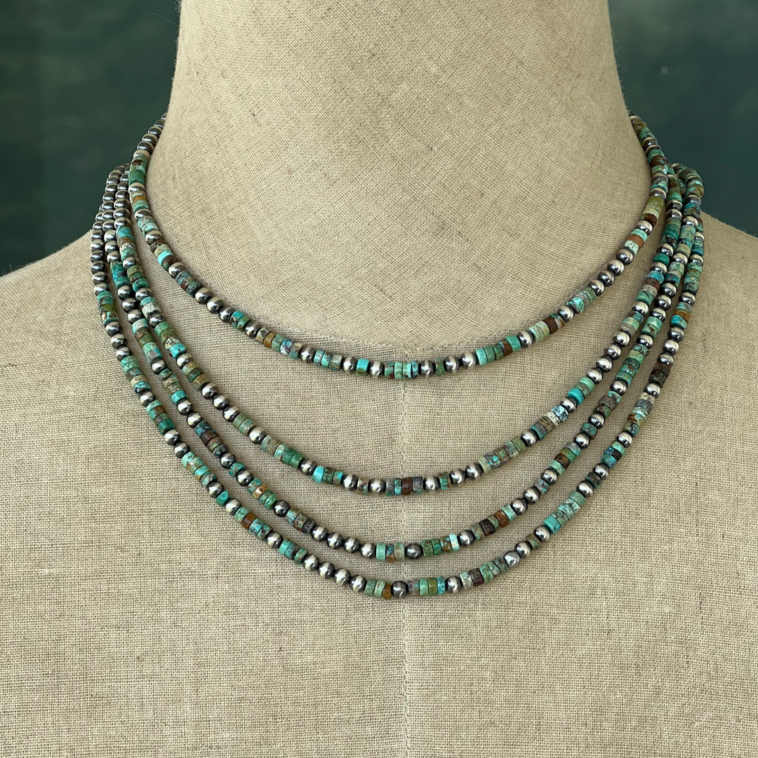 Sterling Silver & Turquoise beaded necklaces on mannequin